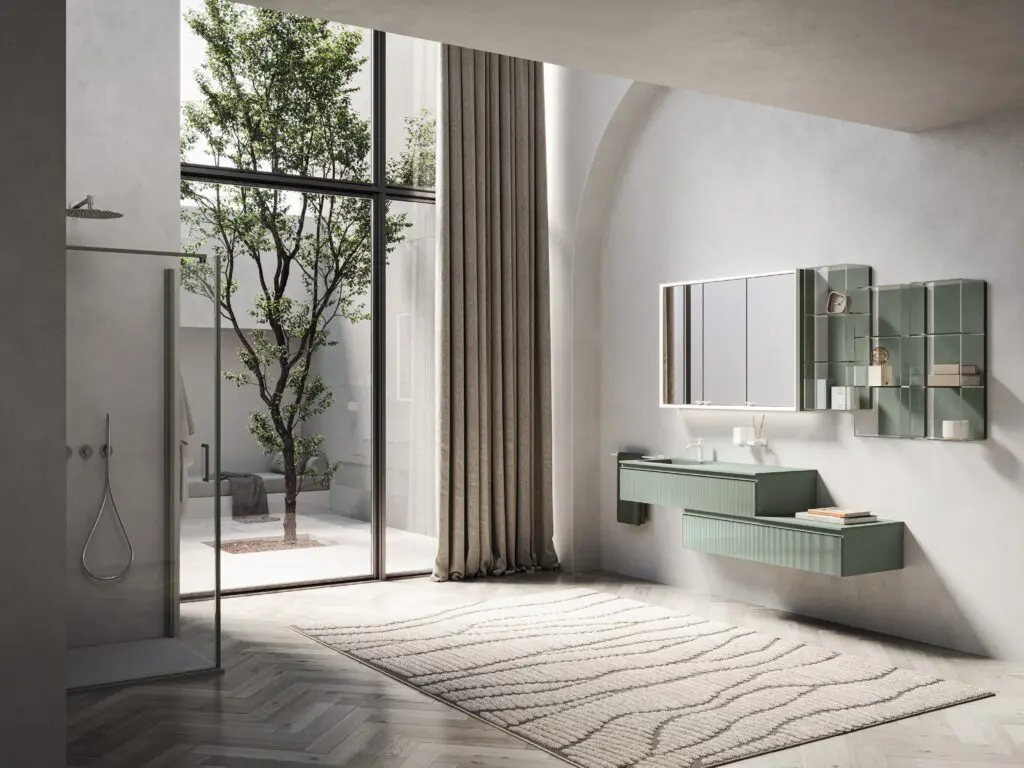 Pirano Evo di INDA: specchio contenitore con illuminazione integrata, telaio personalizzabile e tecnologia UVLUX. Courtesy INDA